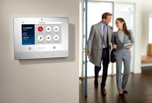 Aressco technician servicing an alarm panel
